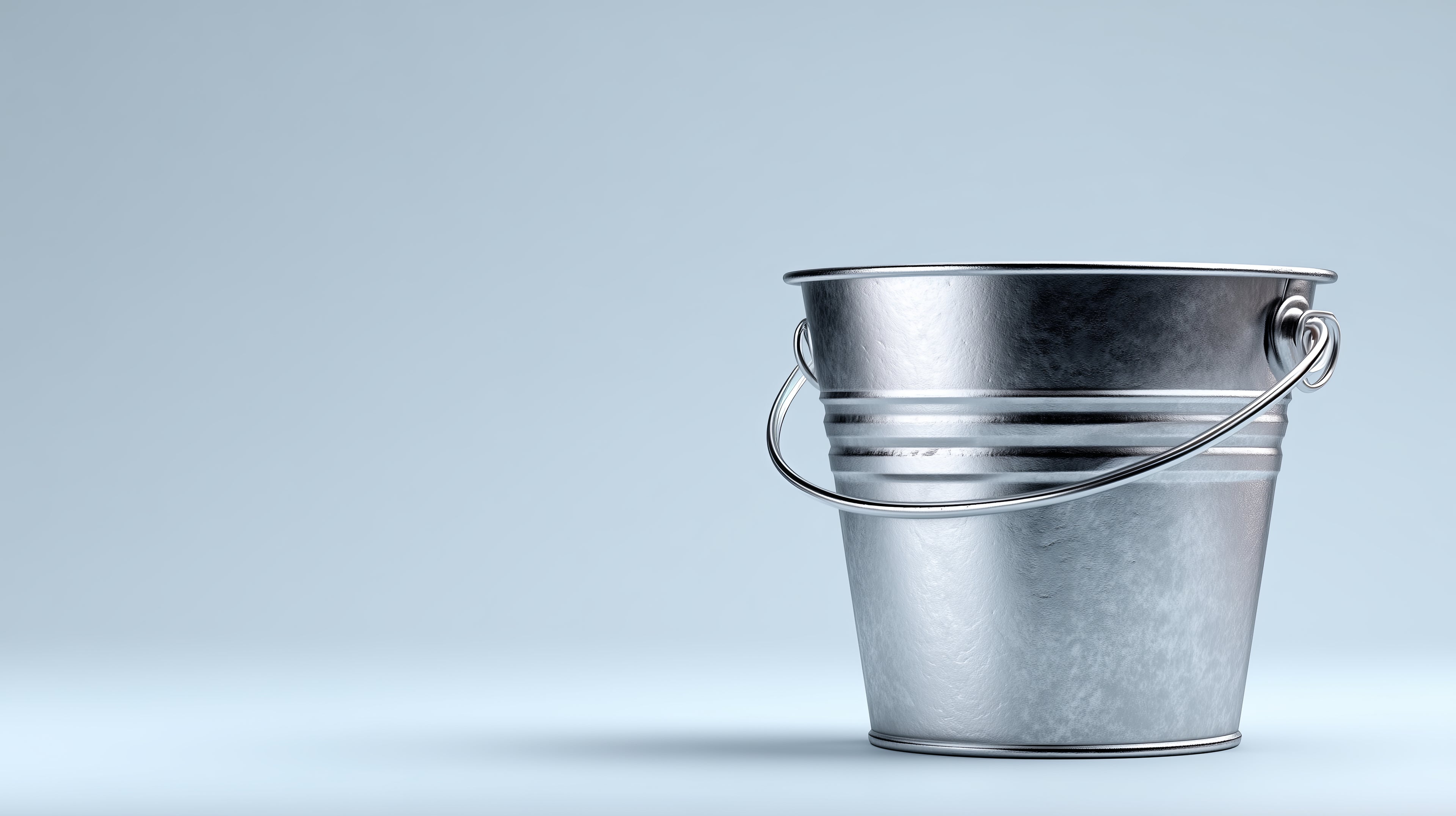 Overflowing bucket illustrating the bucket theory of toxic overload and chronic inflammation